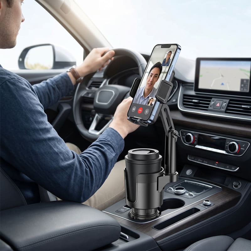 Driver using a cup holder phone mount for a video call